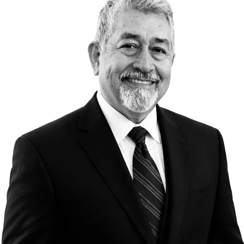 Professional portrait of smiling older man