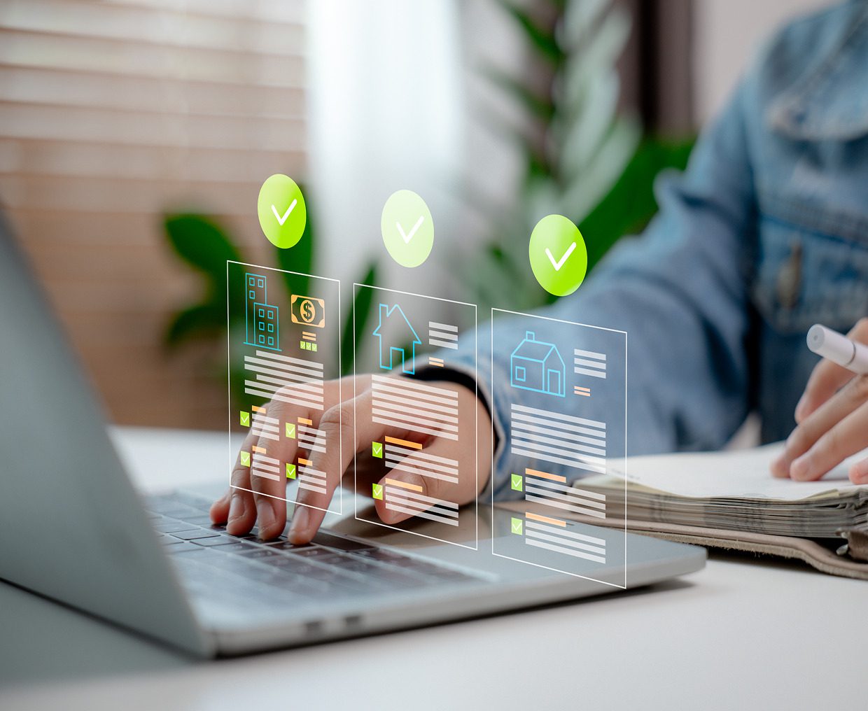 Person using a laptop with digital overlays.